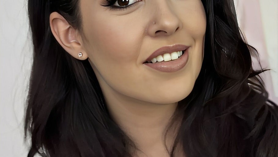 Smiling client at Smak Beauty Clinic Rustenburg, Rustenburg, North West, ZA showing a polished makeup look.