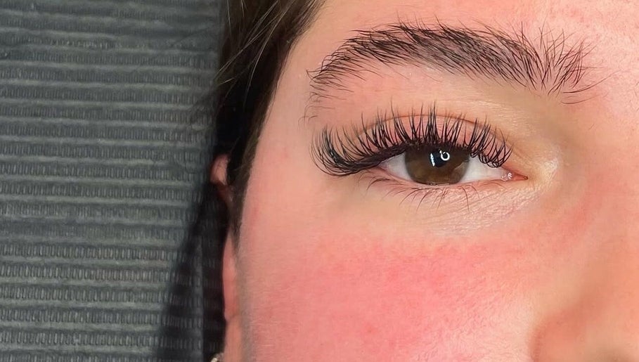 Close-up of eyelash extensions at The Lash Bar, Edmonton, Alberta, CA, highlighting natural beauty.