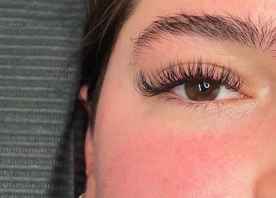 Close-up of eyelash extensions at The Lash Bar, Edmonton, Alberta, CA, highlighting natural beauty.