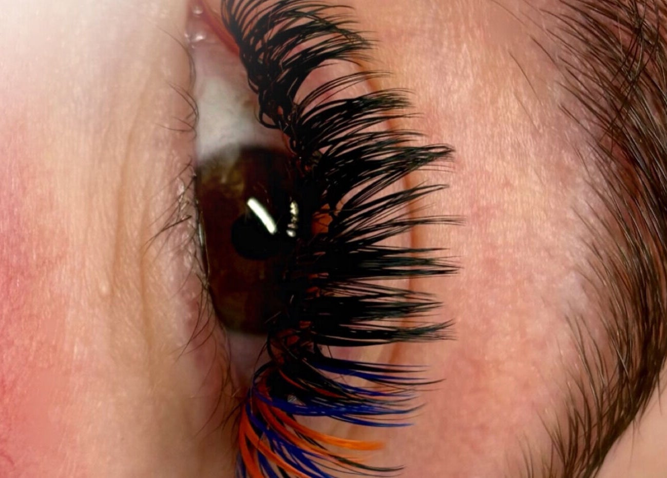 Close-up of expertly styled lashes at The Lash Bar in Edmonton, Alberta, CA, showcasing vibrant colors.
