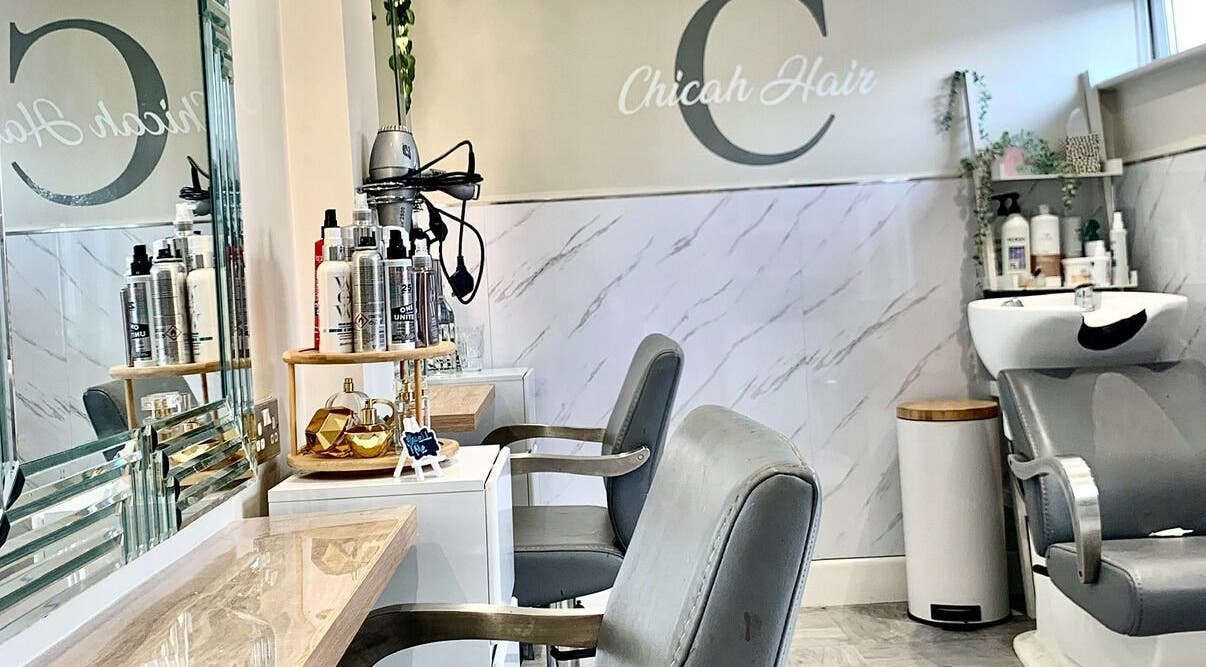 Chicah Hair Ryde salon interior with stylish chairs and modern decor in Ryde, England, GB.