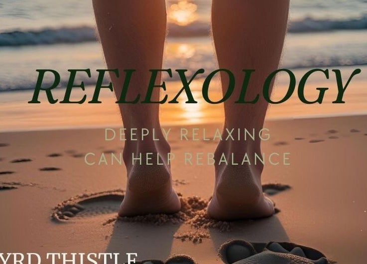 Footprints in sand at sunset for reflexology at Wyrd Thistle Therapies, Methil, Scotland, GB.