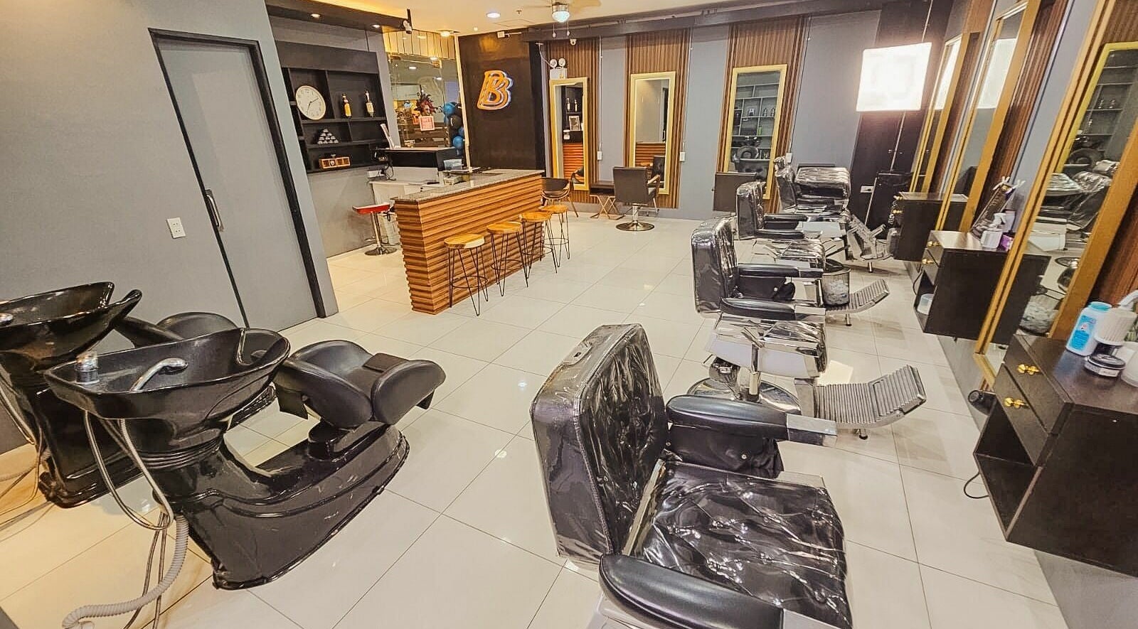 Modern salon interior at Baguio Branch, Baguio, Cordillera Administrative Region, PH with stylish chairs and mirrors.