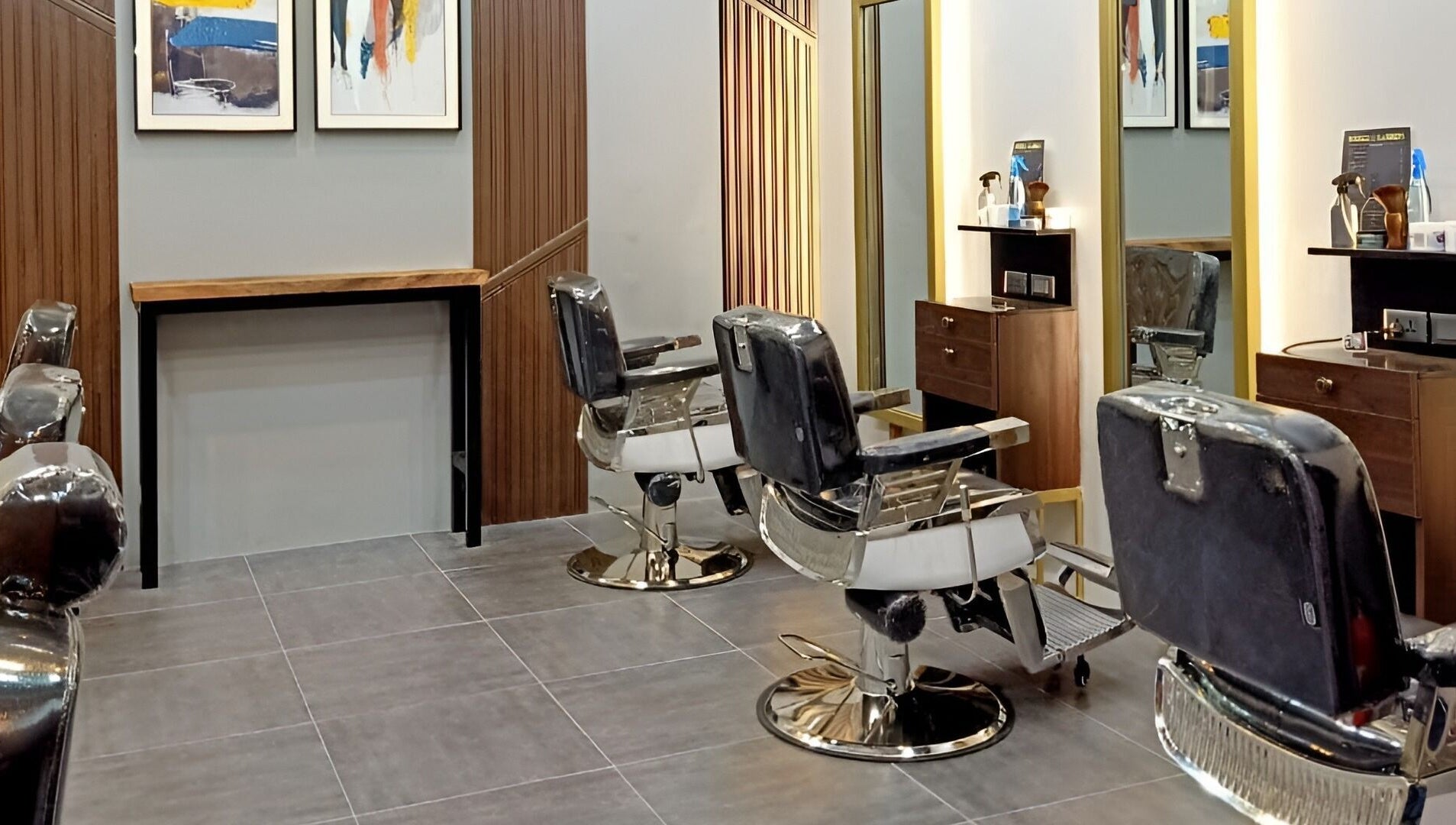 Modern barber chairs in a stylish salon at La Union - Robinsons Place Mall, San Fernando, Ilocos Region, PH.