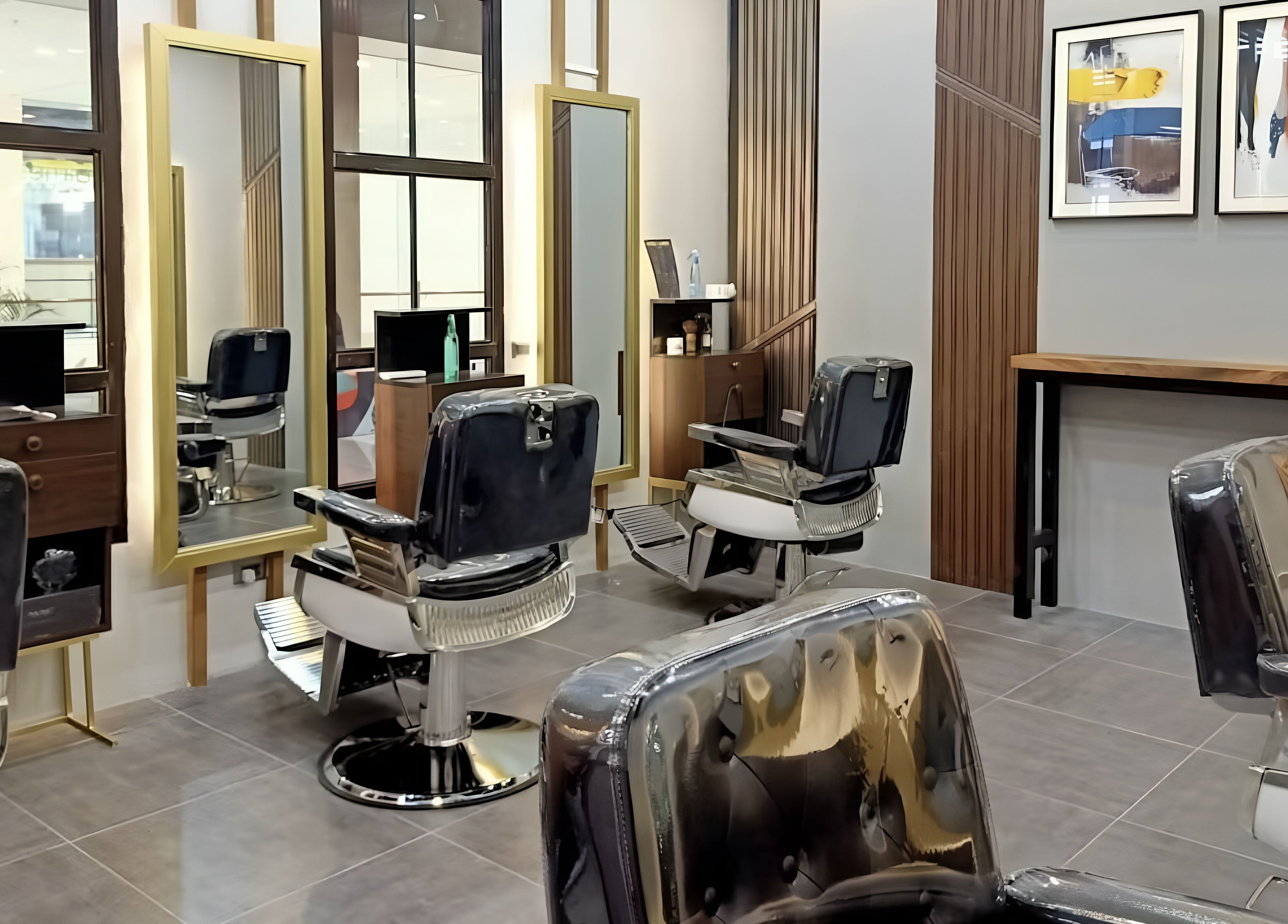 Modern hair salon at La Union - Robinsons Place Mall, San Fernando, Ilocos Region, PH, with sleek chairs and mirrors.