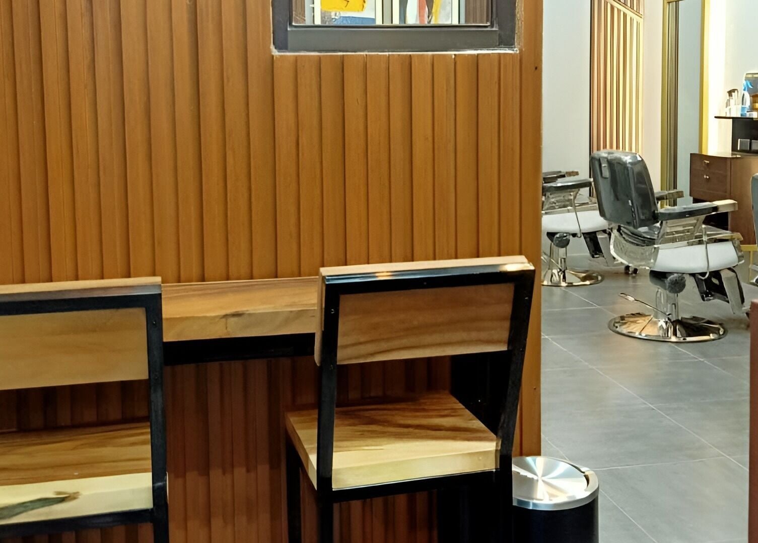 Modern salon interior at La Union - Robinsons Place Mall, San Fernando, Ilocos Region, PH showcasing sleek chairs and decor.