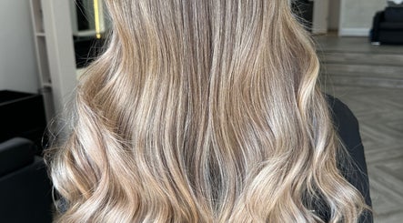 Blonde waves styled at Glam Hair By Maya, Buckhurst Hill, England, GB for a chic look.
