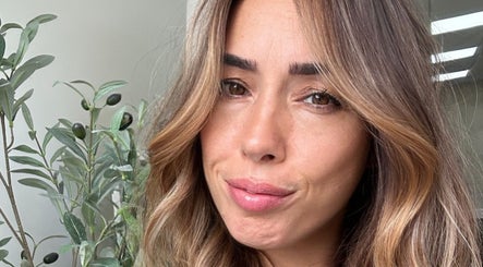 Woman with highlighted hair at Glam Hair By Maya in Buckhurst Hill, England, GB.