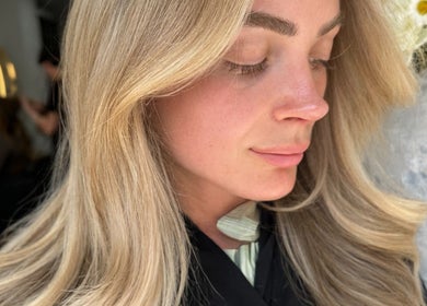 Blonde woman showcasing stunning hair at Glam Hair By Maya, Buckhurst Hill, England, GB.