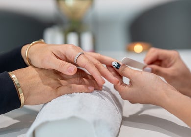 Manicure session at Star Nails & Spa, Toronto, Ontario, CA, showcasing detailed nail care techniques.