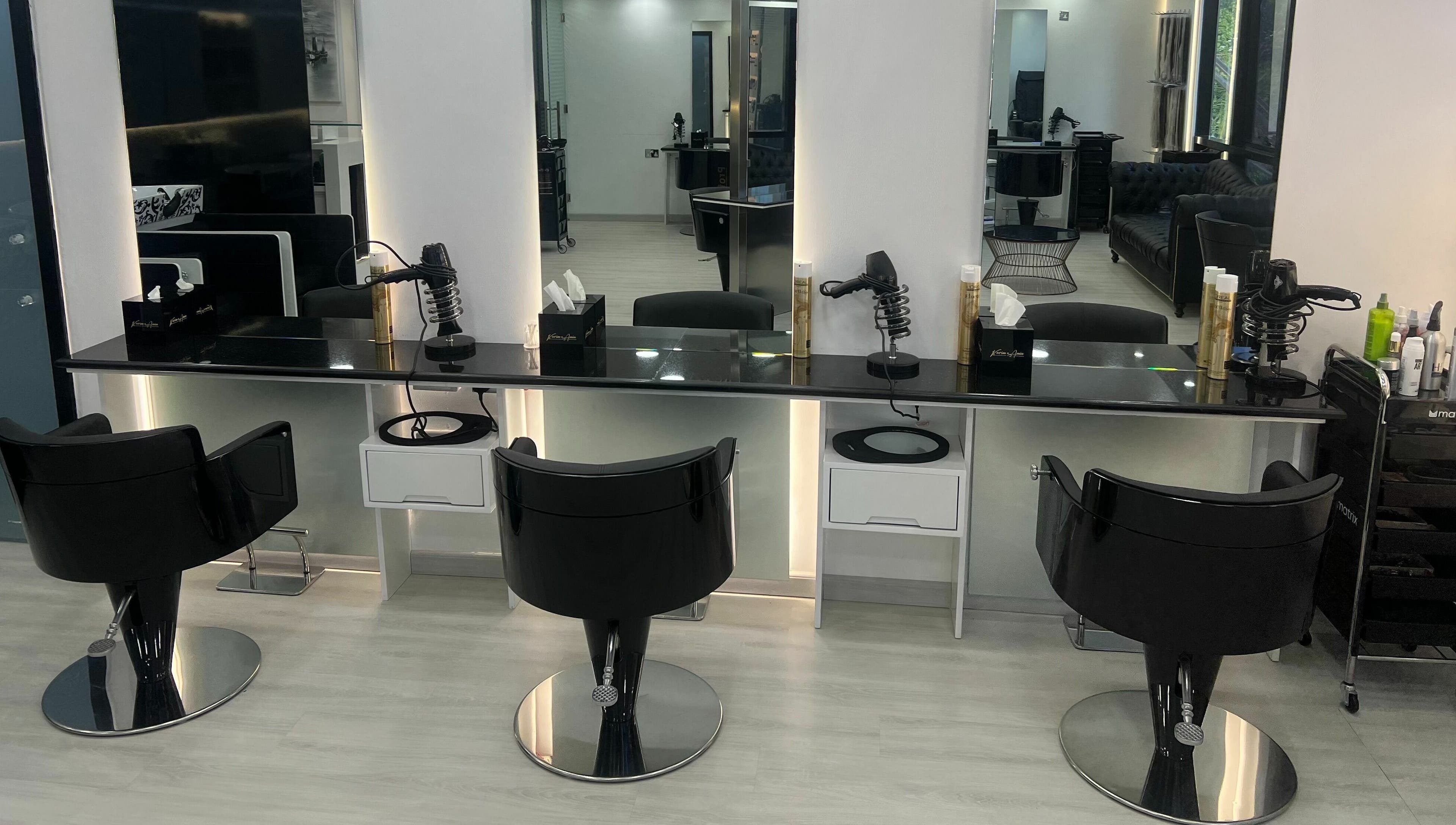 Modern styling stations at Karim And Amin Hair and Beauty Salon | Tecom in Dubai, Dubai, AE.