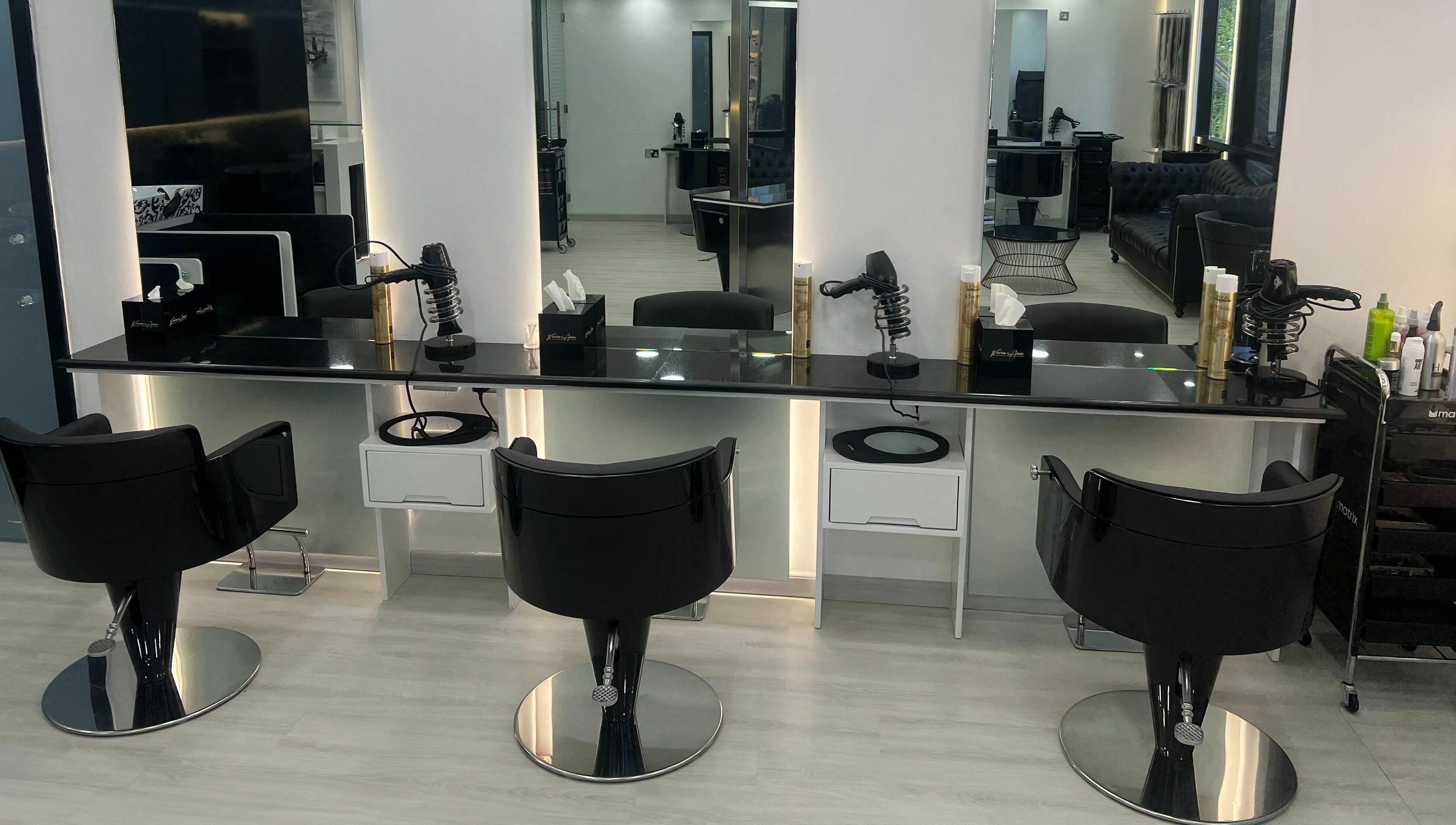 Modern styling stations at Karim And Amin Hair and Beauty Salon | Tecom in Dubai, Dubai, AE.