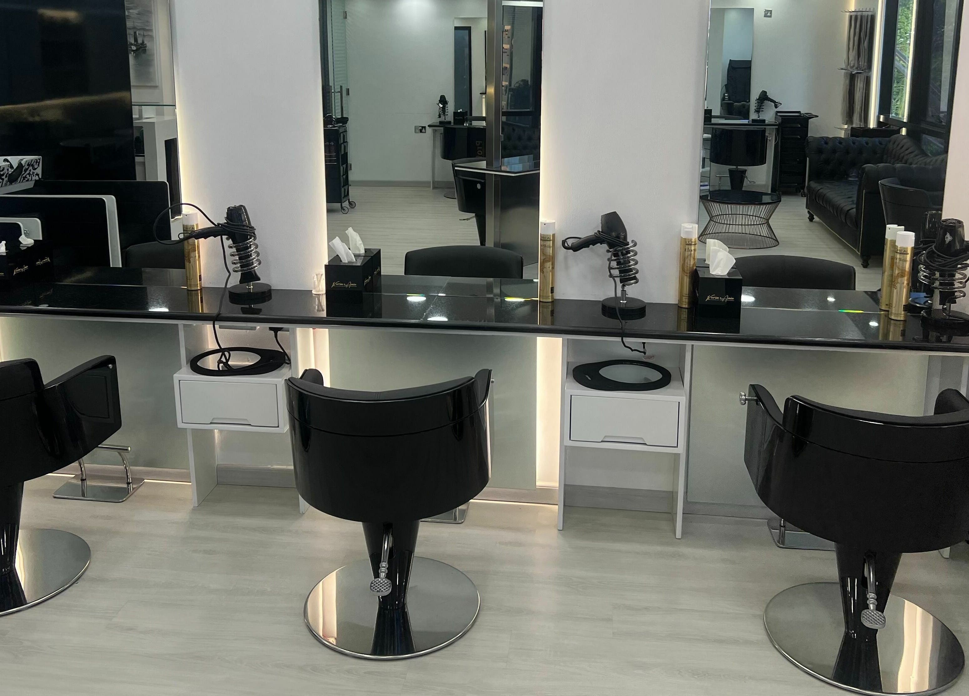 Modern styling stations at Karim And Amin Hair and Beauty Salon | Tecom in Dubai, Dubai, AE.