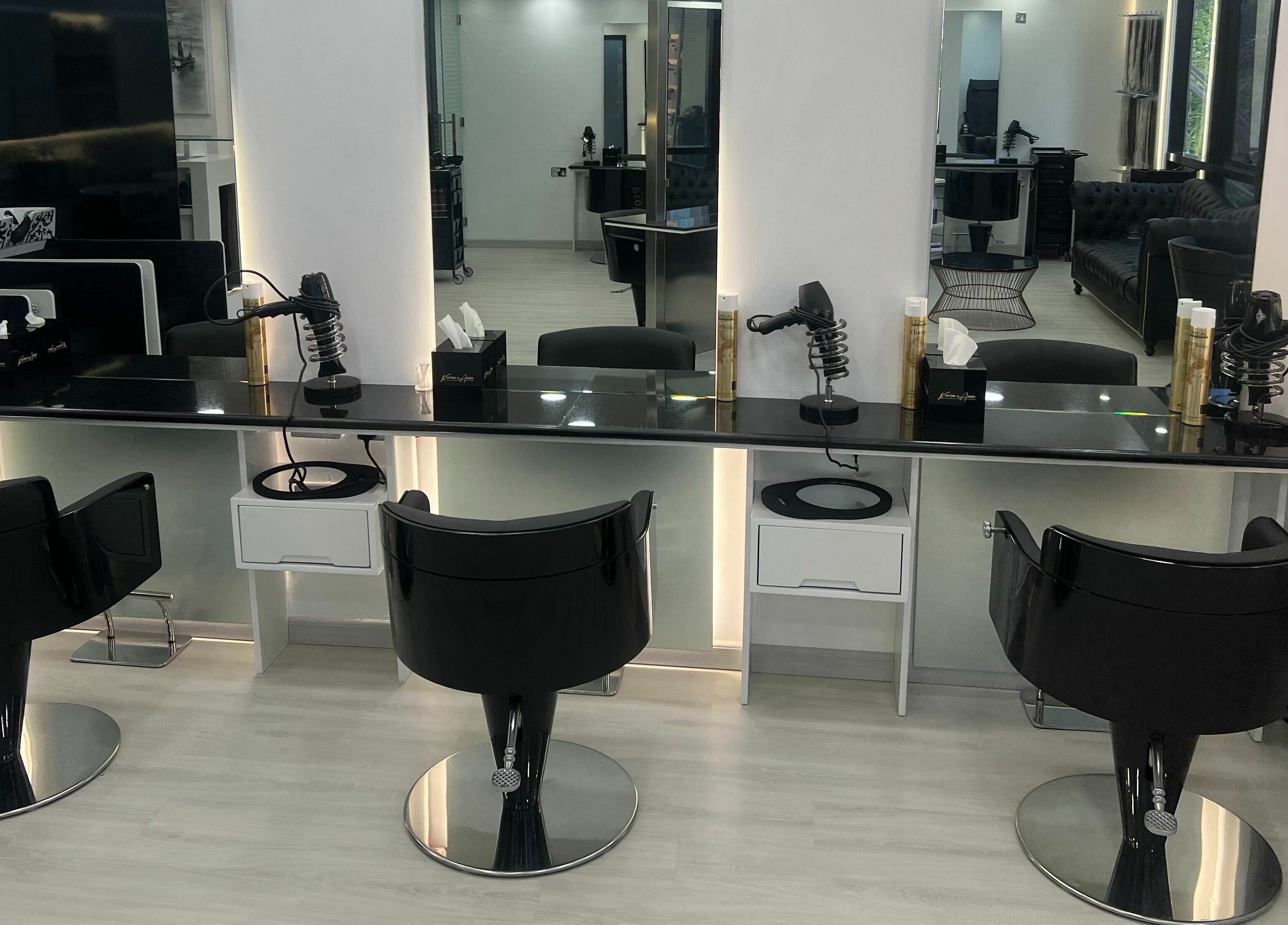 Modern styling stations at Karim And Amin Hair and Beauty Salon | Tecom in Dubai, Dubai, AE.