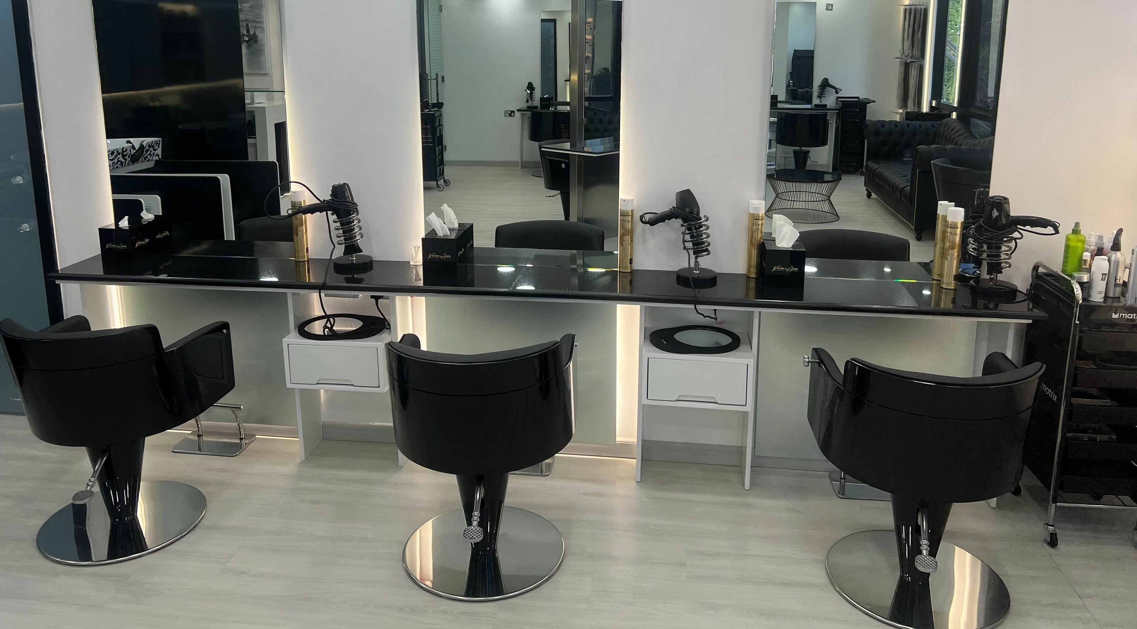 Modern styling stations at Karim And Amin Hair and Beauty Salon | Tecom in Dubai, Dubai, AE.