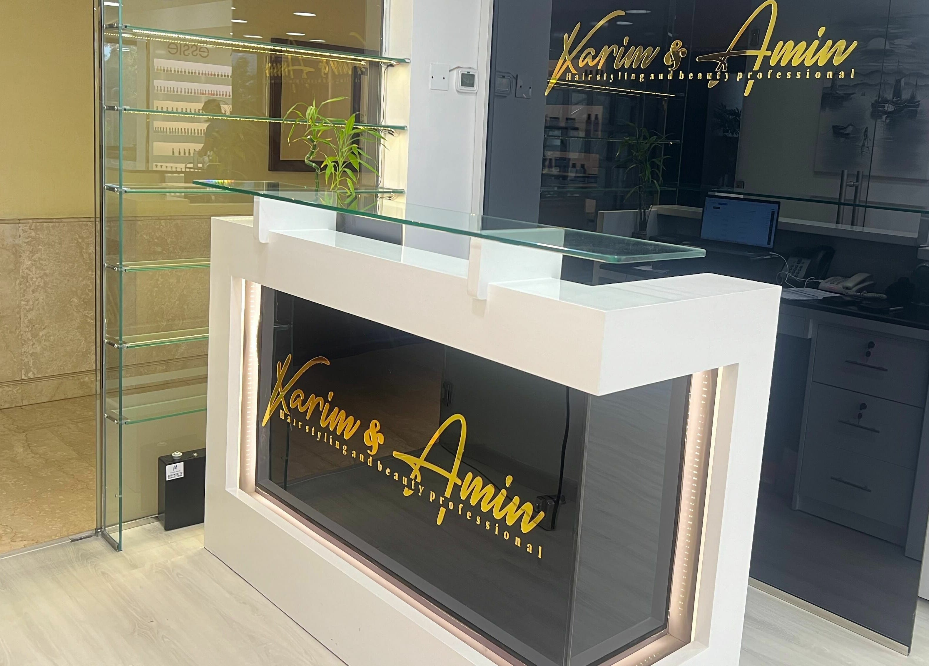 Reception desk at Karim And Amin Hair and Beauty Salon | Tecom, Dubai, Dubai, AE with modern design elements.