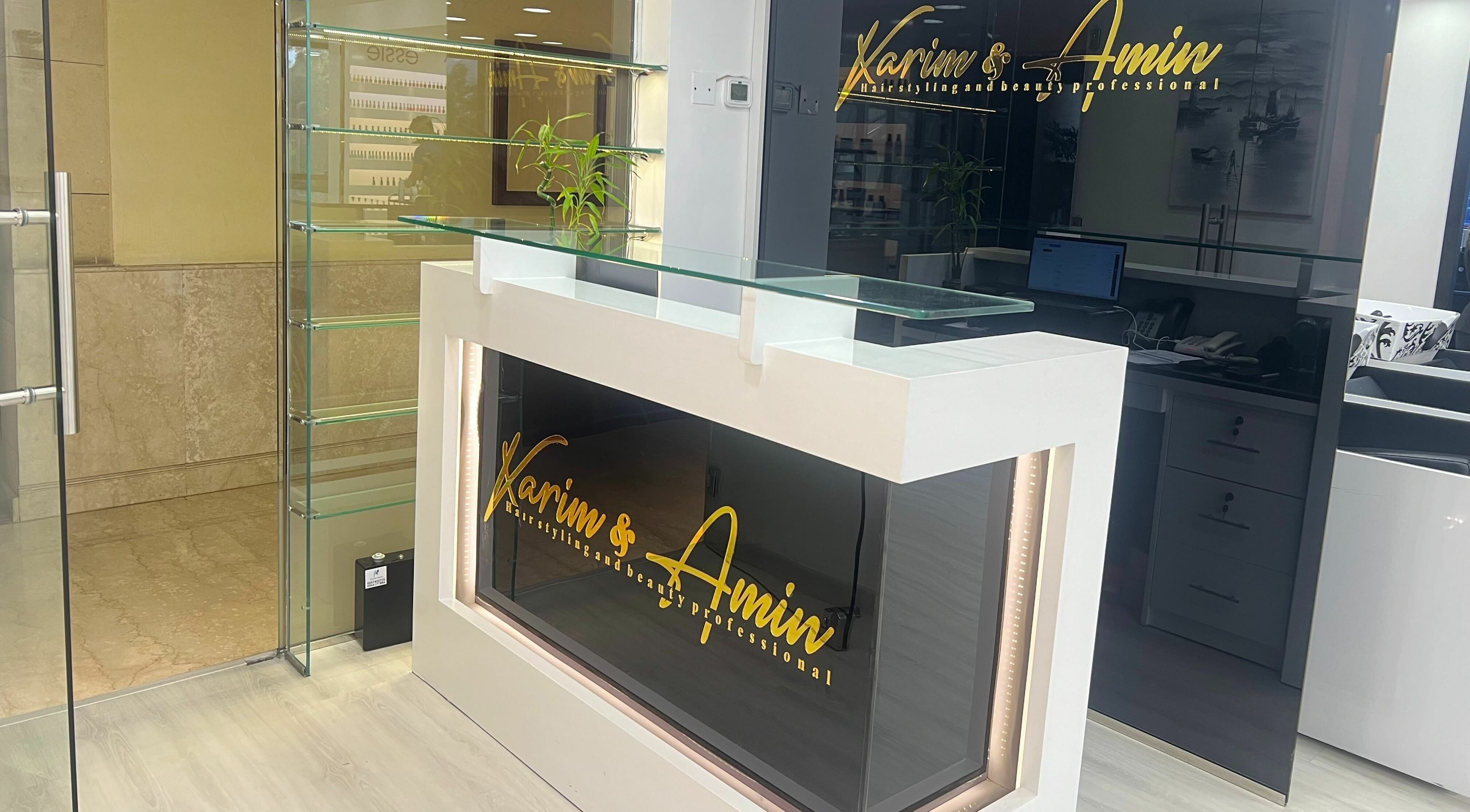 Reception desk at Karim And Amin Hair and Beauty Salon | Tecom, Dubai, Dubai, AE with modern design elements.
