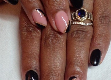 Stylish manicure at 52 Hof Street Tableview, Cape Town, Western Cape, ZA, showcasing black and nude design.