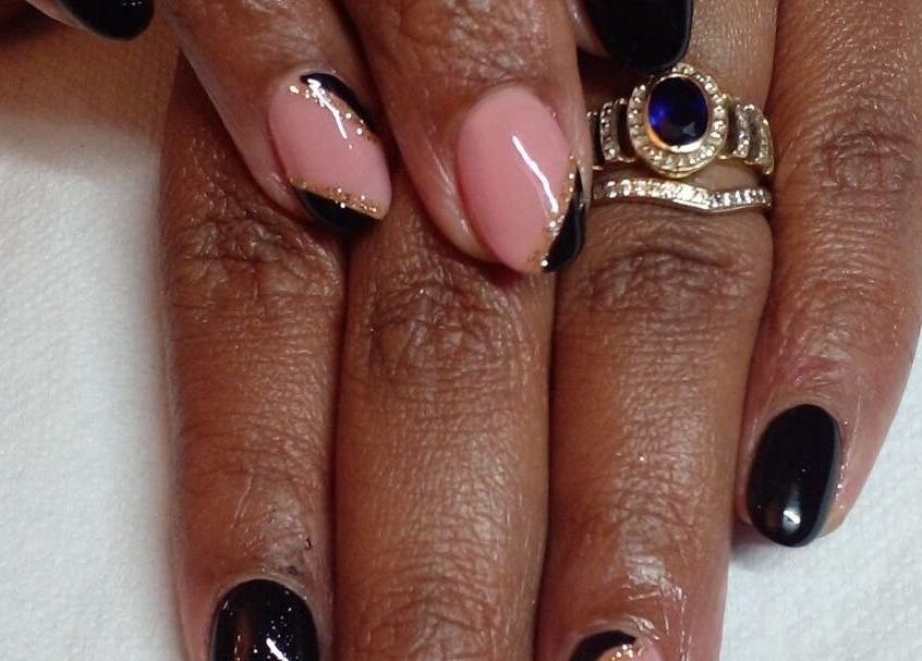 Stylish manicure at 52 Hof Street Tableview, Cape Town, Western Cape, ZA, showcasing black and nude design.
