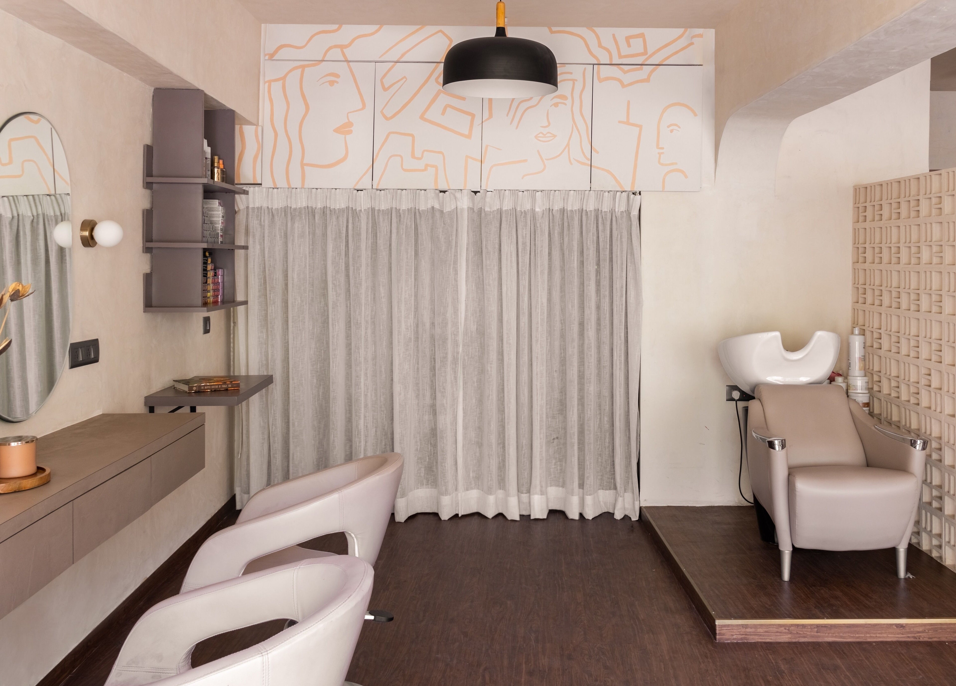 Chic salon interior of Curls & Color Co., Thane, Maharashtra, IN with elegant seating and modern design.