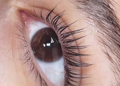 Close-up of eyelash treatment at MMBW Industry, Ventura, California, US enhancing natural beauty.