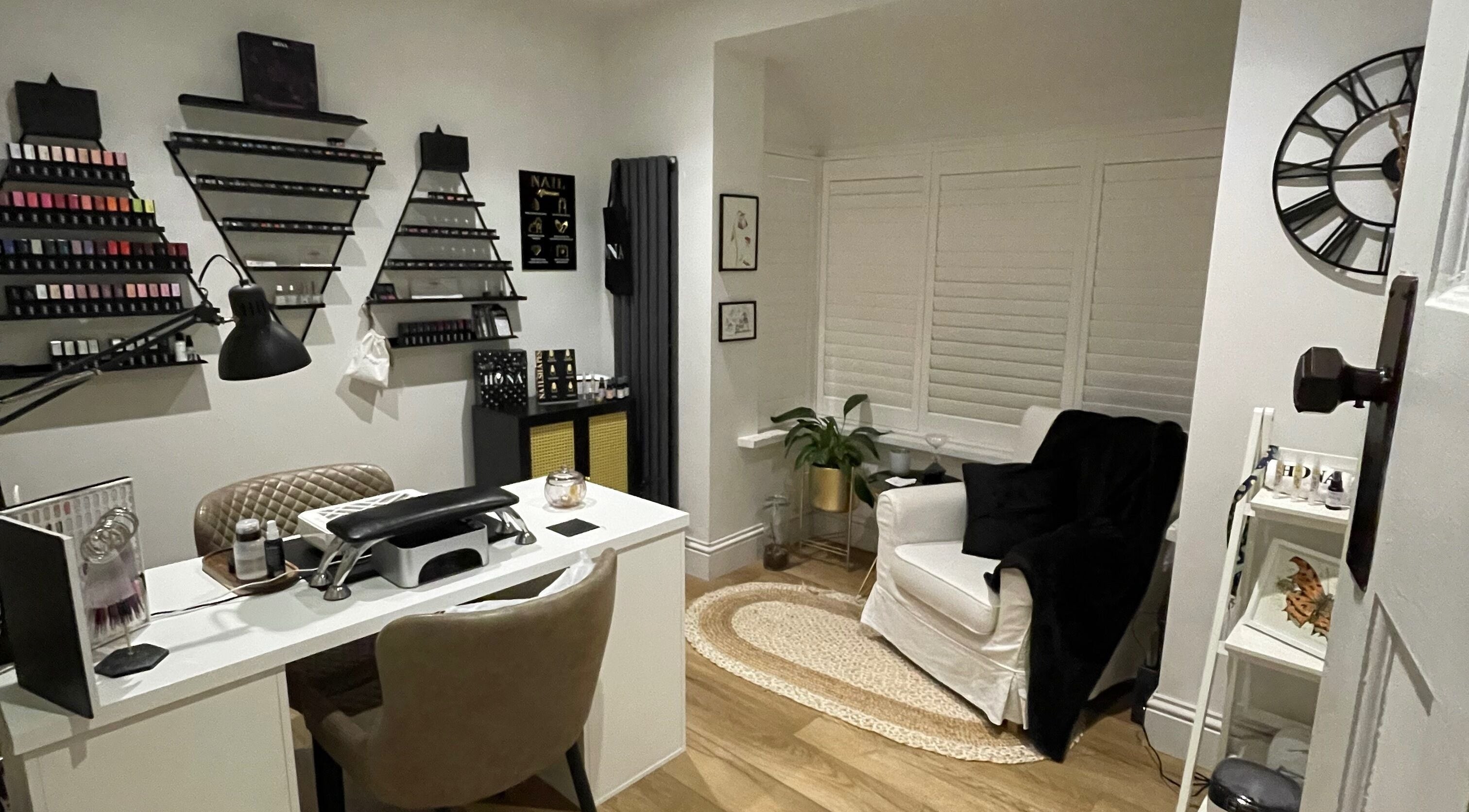 Elegant nail salon interior at Nails by Robyn Slade, Brighton And Hove, England, GB, with chic decor and nail polish display.