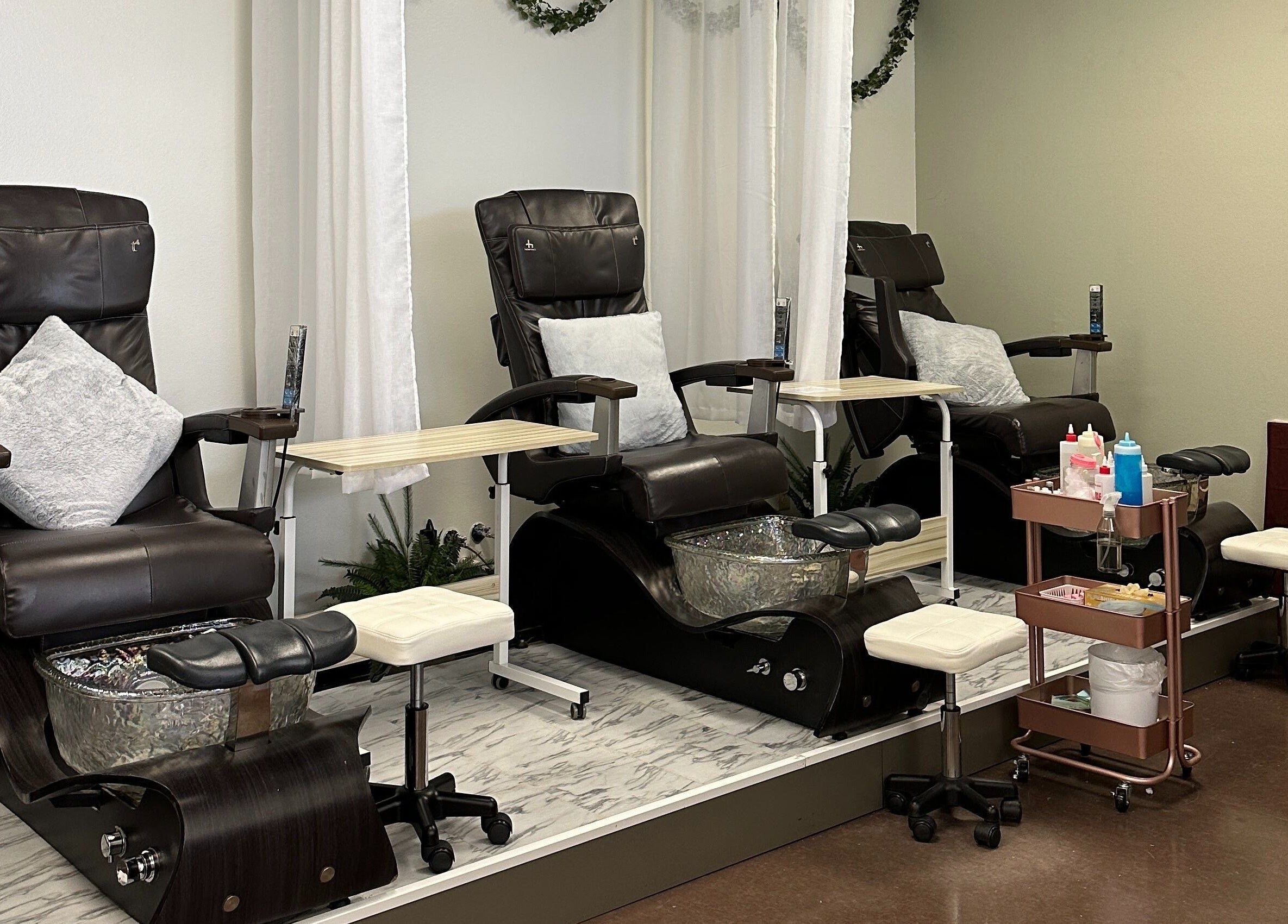 Comfortable pedicure chairs at Chabaa Private Nail Salon, Branson, Missouri, US, offering luxury nail treatments.