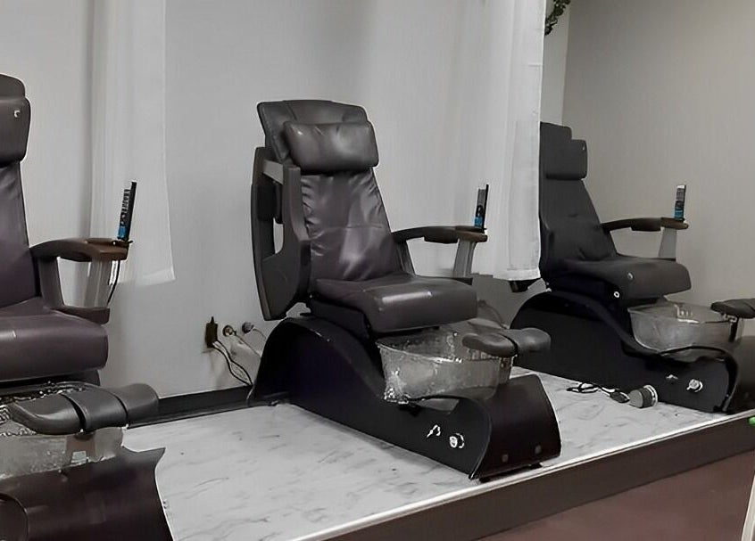 Luxurious pedicure chairs at Chabaa Private Nail Salon in Branson, Missouri, US, offering a serene spa experience.