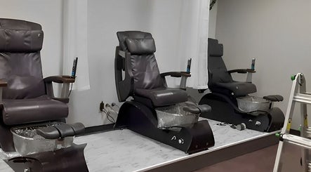 Luxurious pedicure chairs at Chabaa Private Nail Salon in Branson, Missouri, US, offering a serene spa experience.