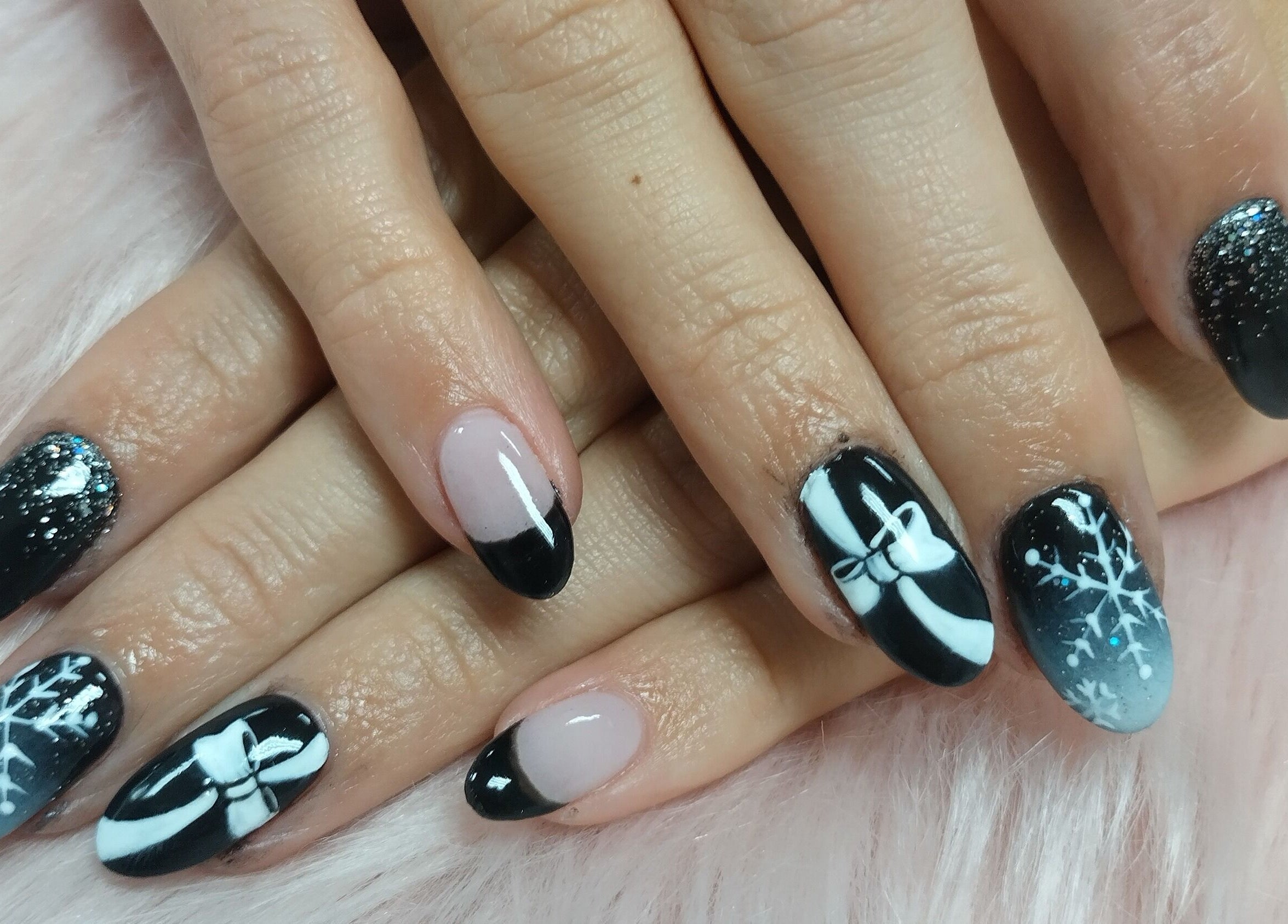 Elegant winter-themed nail art at Chabaa Private Nail Salon, Branson, Missouri, US.