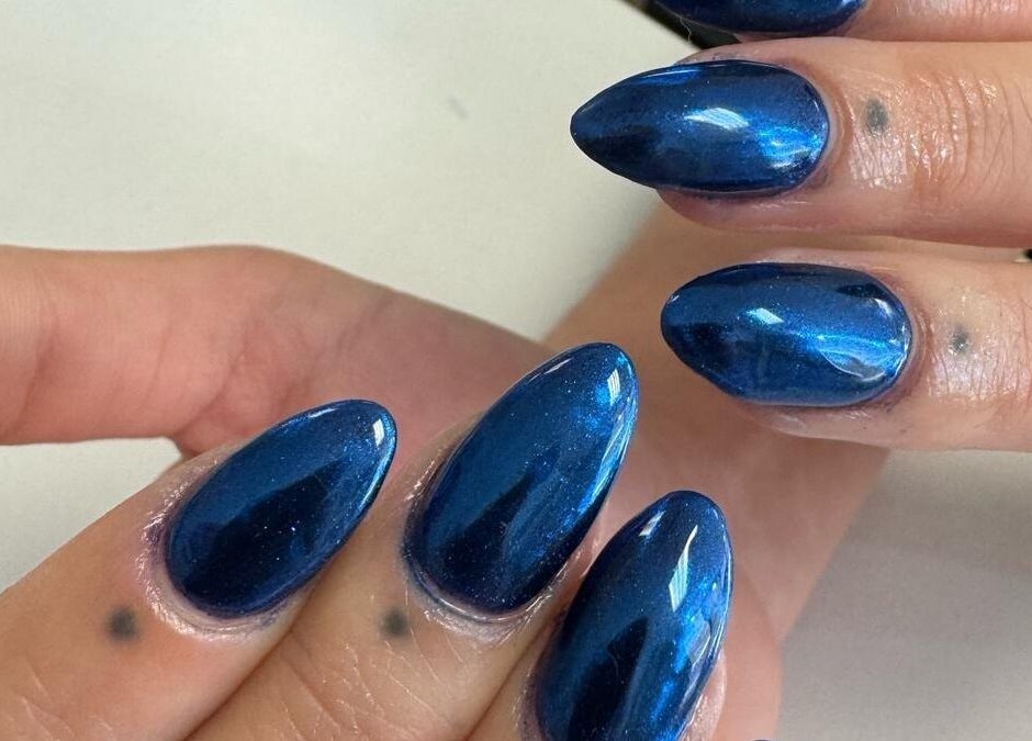 Blue gel nail art at Chabaa Private Nail Salon, Branson, Missouri, US.