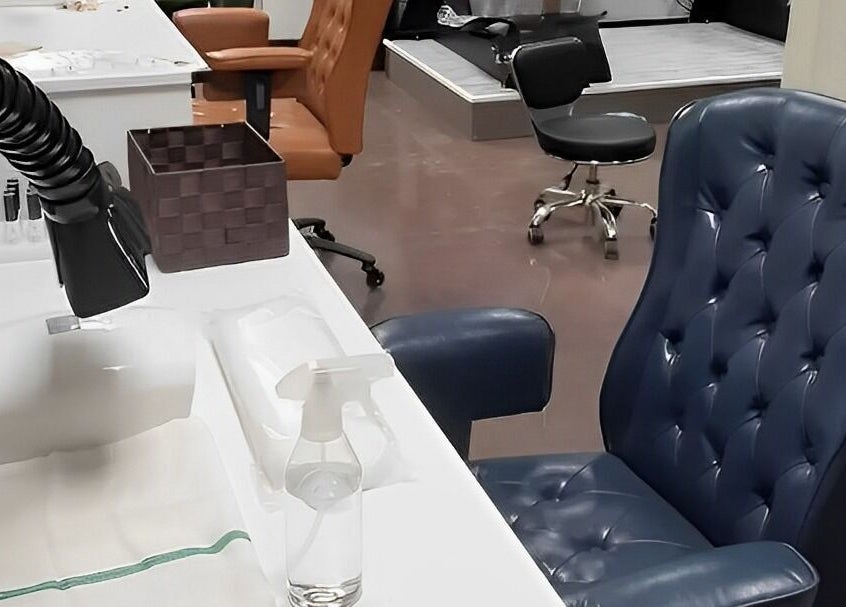 Elegant leather chairs and nail stations at Chabaa Private Nail Salon in Branson, Missouri, US.