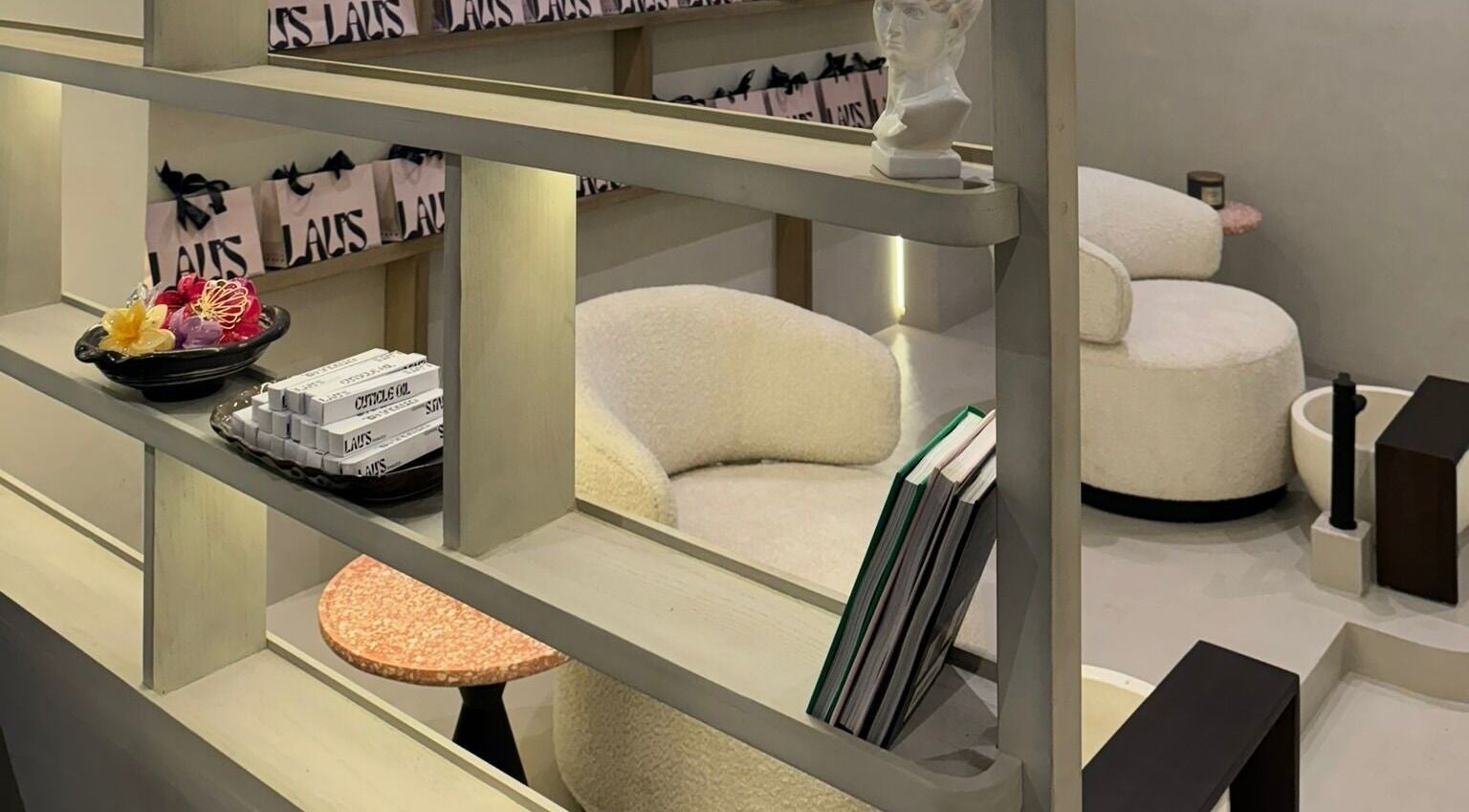 Cozy interior of LAU’S BEAUTY, Bali, Bali, ID showcasing elegant decor and plush seating.