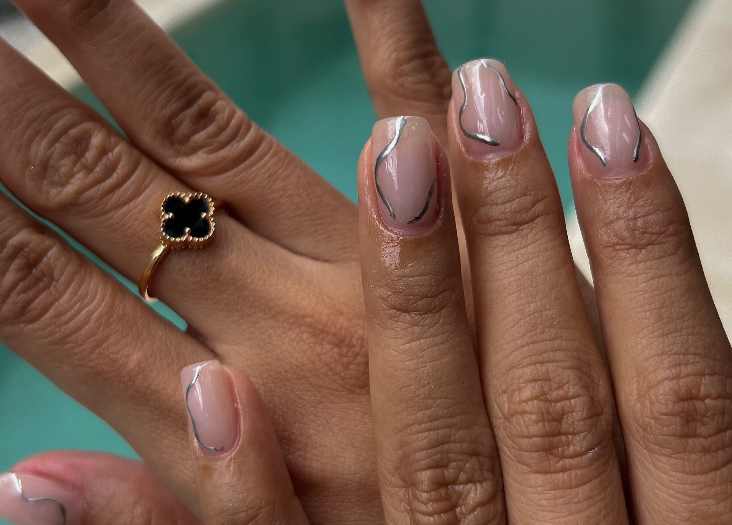 Stylish nail art design at LAU’S BEAUTY in Bali, Bali, ID, featuring modern silver accents.