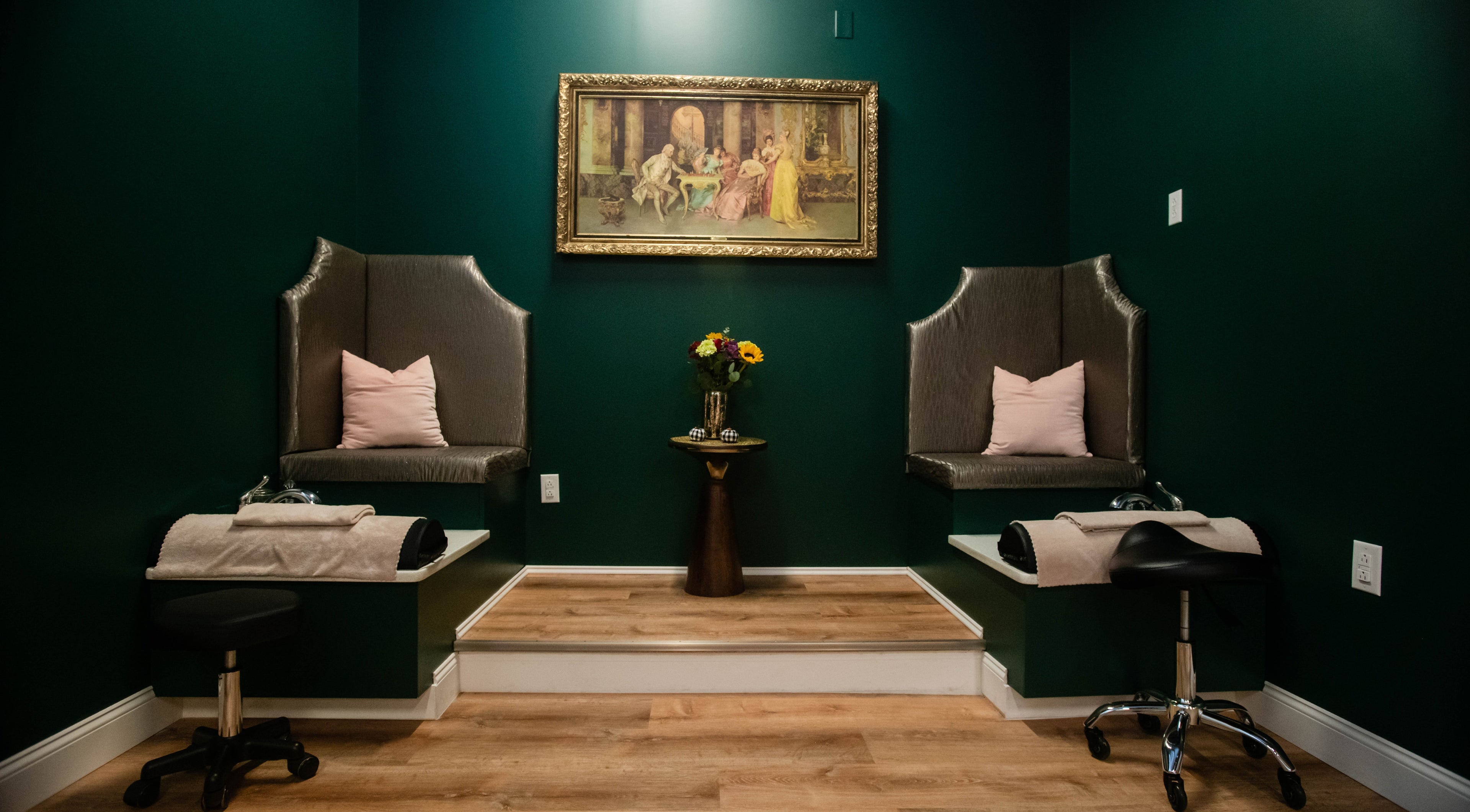 Luxurious seating area at Case of Elegance Wellness Spa in Archbald, Pennsylvania, US with plush chairs.