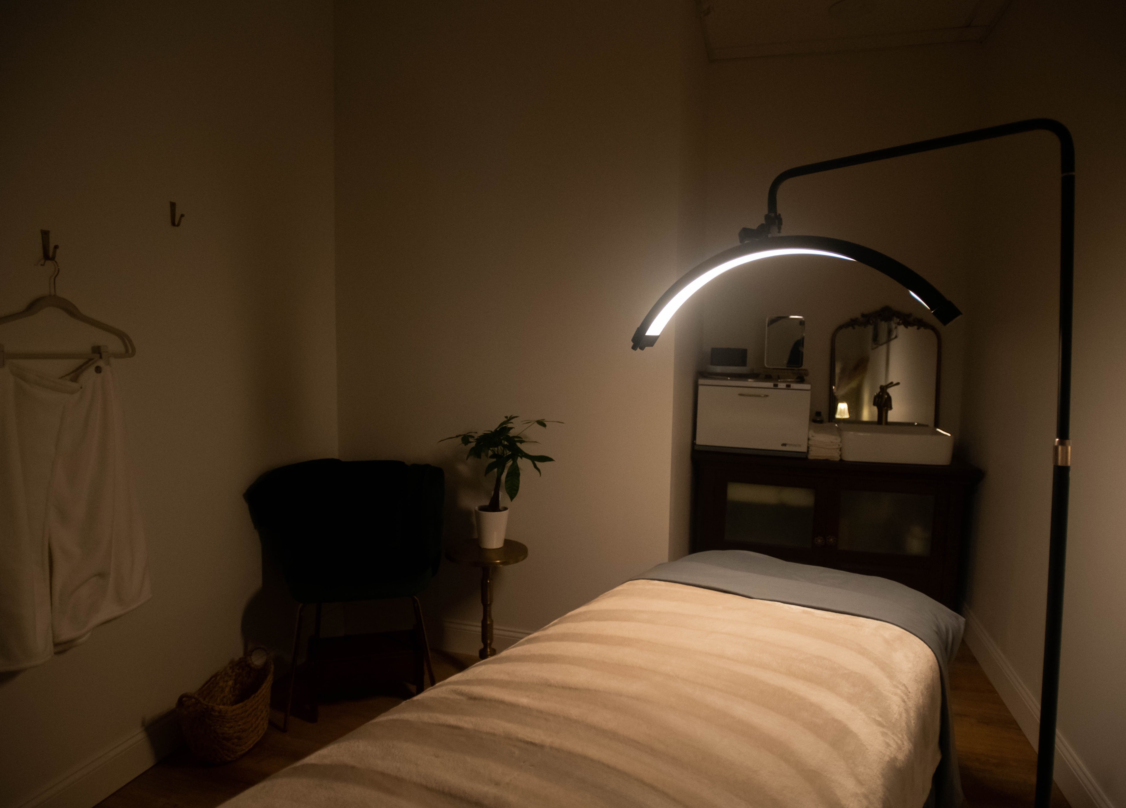A serene treatment room at Case of Elegance Wellness Spa, Archbald, Pennsylvania, US, with a massage table.