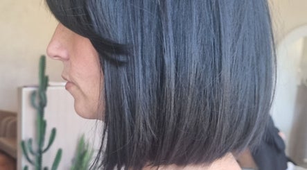 Chic bob haircut styled at Salon Nine, Glenrothes, Scotland, GB showcasing sleek, shiny hair.