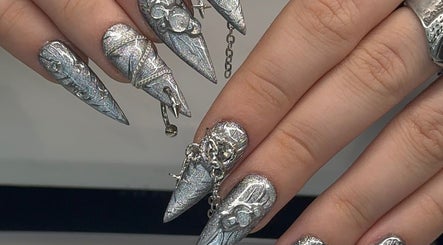 Intricate silver nail art at Luxe by Nade, Pickering, England, GB.