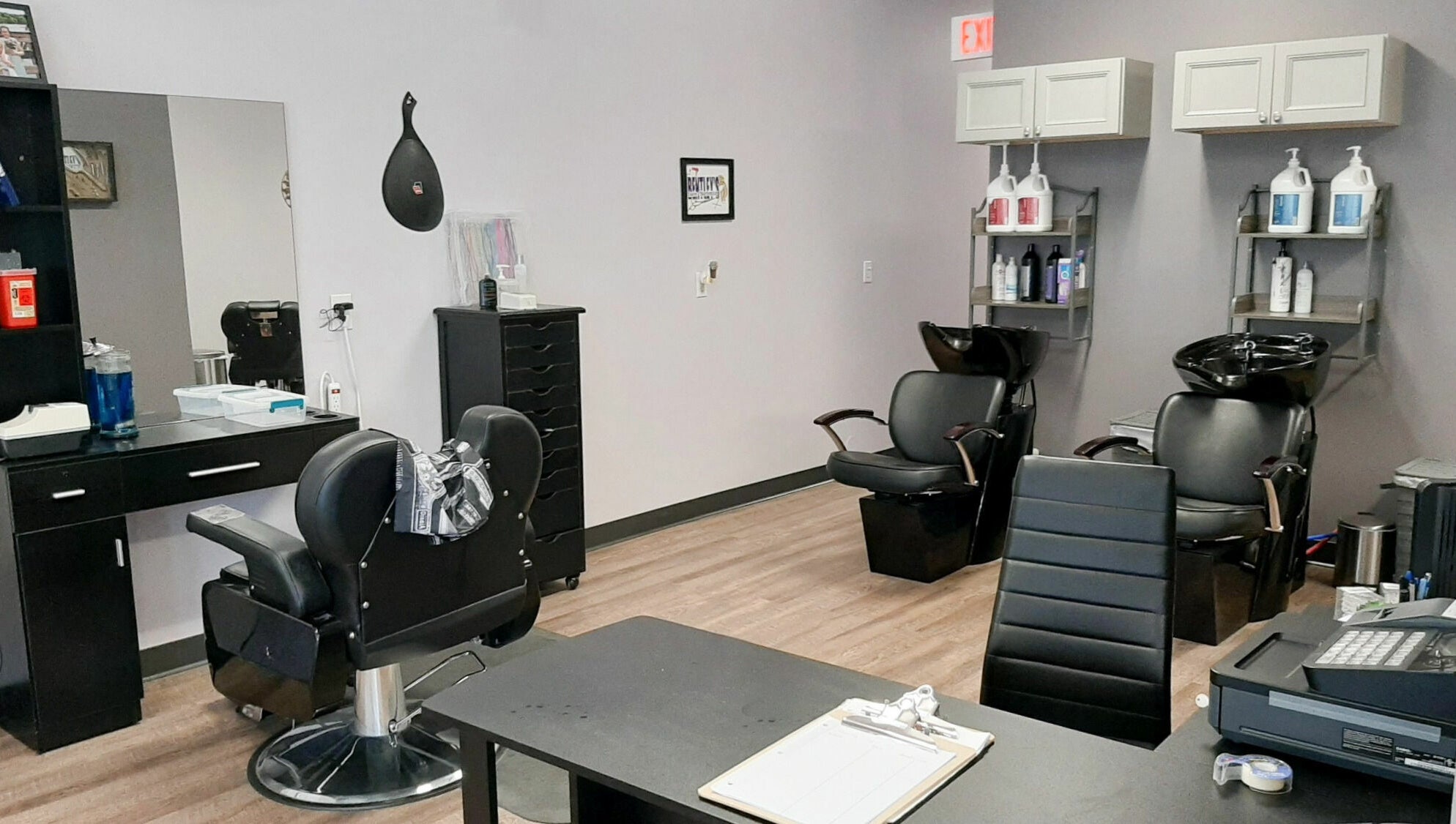 Bentley's Salon and Barbershop interior with modern chairs and washing stations in Schuylerville, New York, US.
