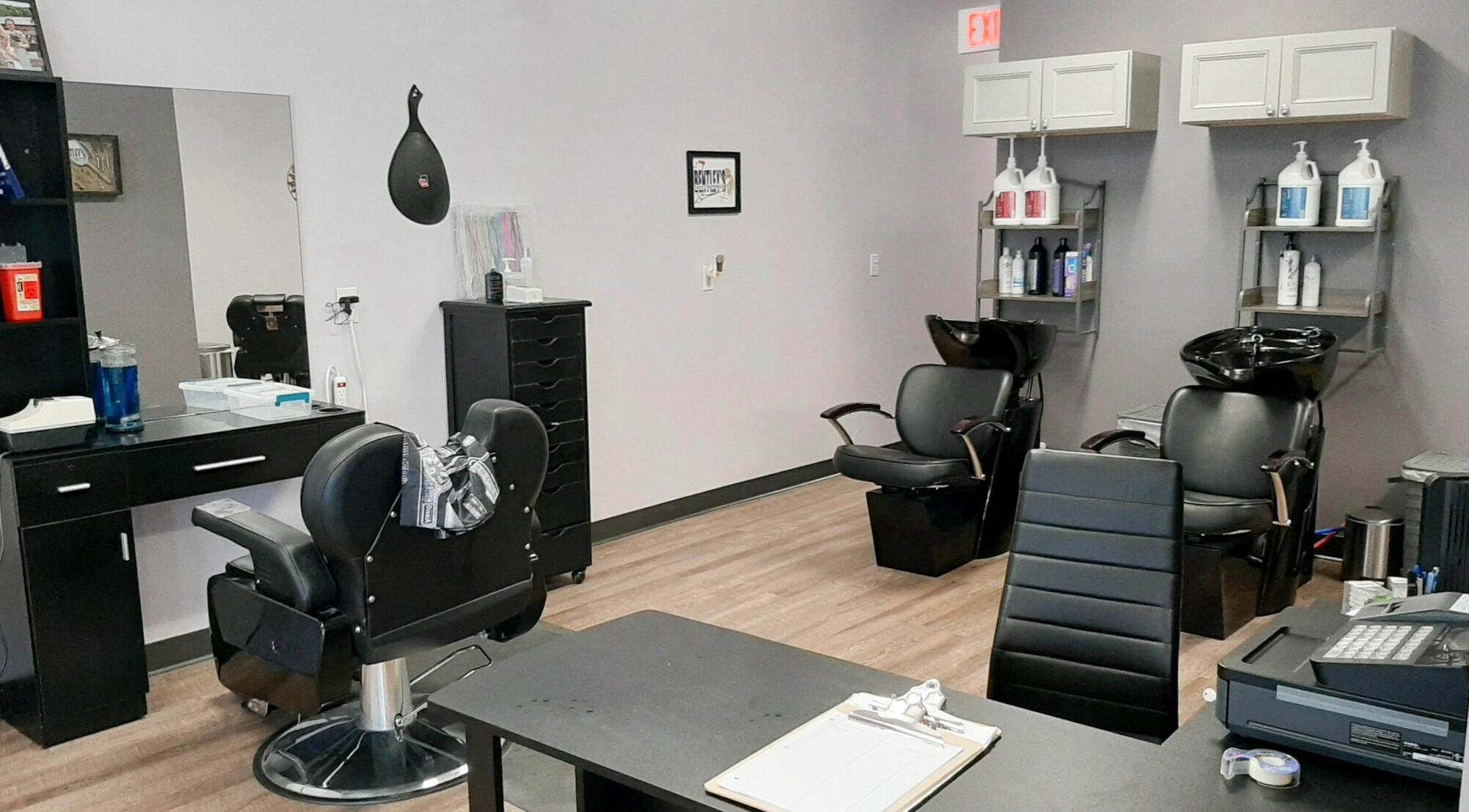 Bentley's Salon and Barbershop interior with modern chairs and washing stations in Schuylerville, New York, US.