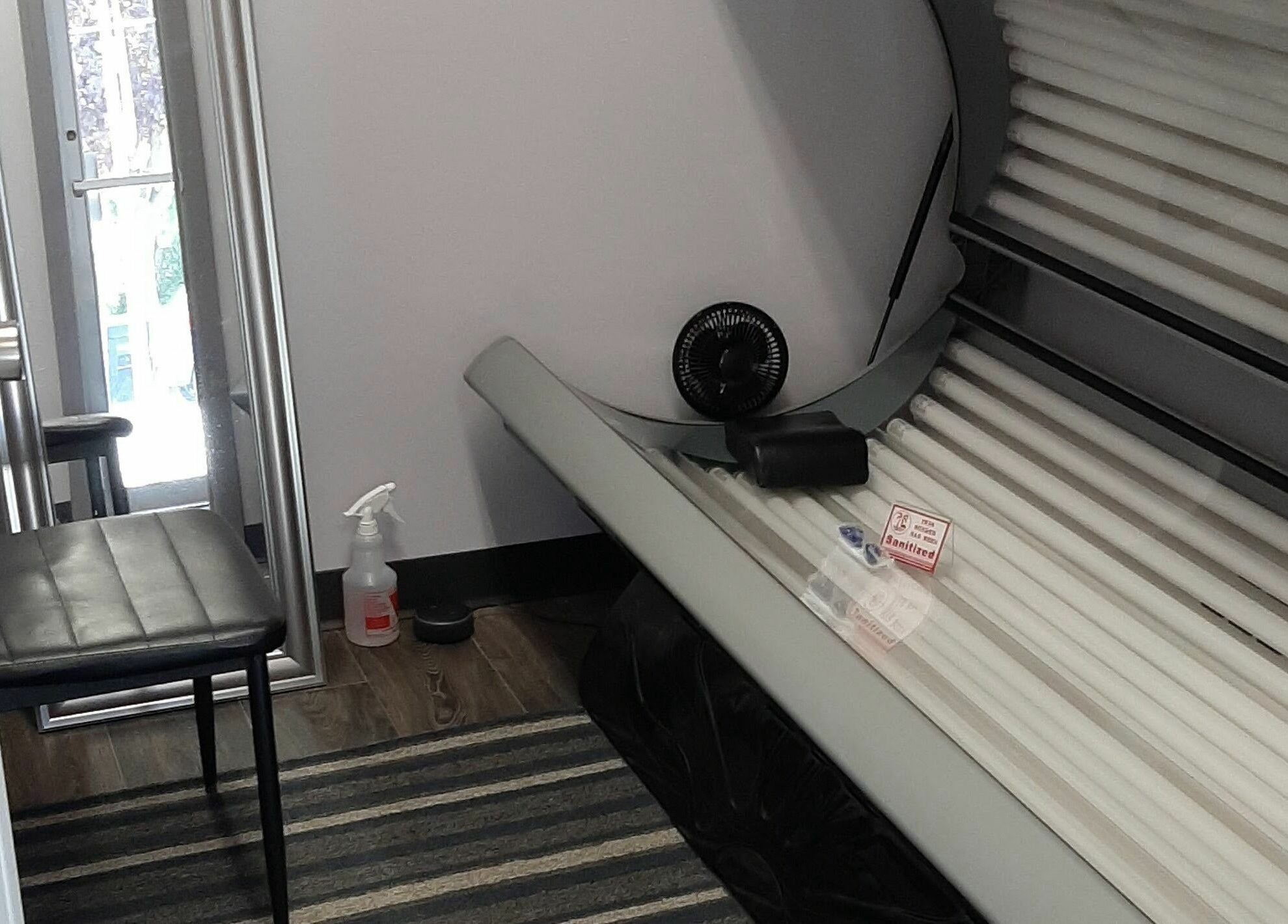 Tanning bed at Bentley's Salon and Barbershop, Schuylerville, New York, US, ready for clients.