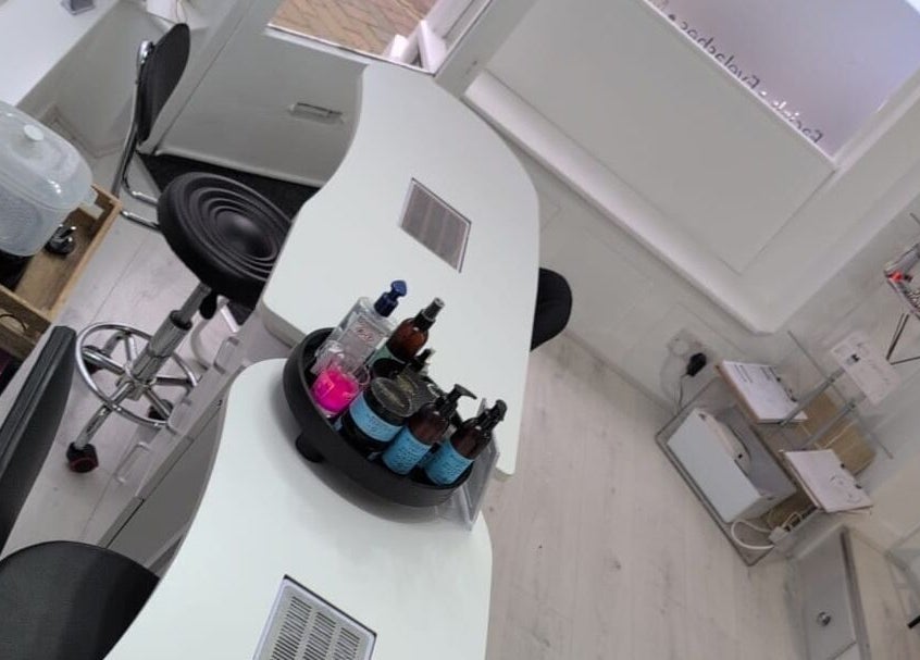 Elegant nail care station at Beauty Corner, Ashford, England, GB, showcasing premium products.