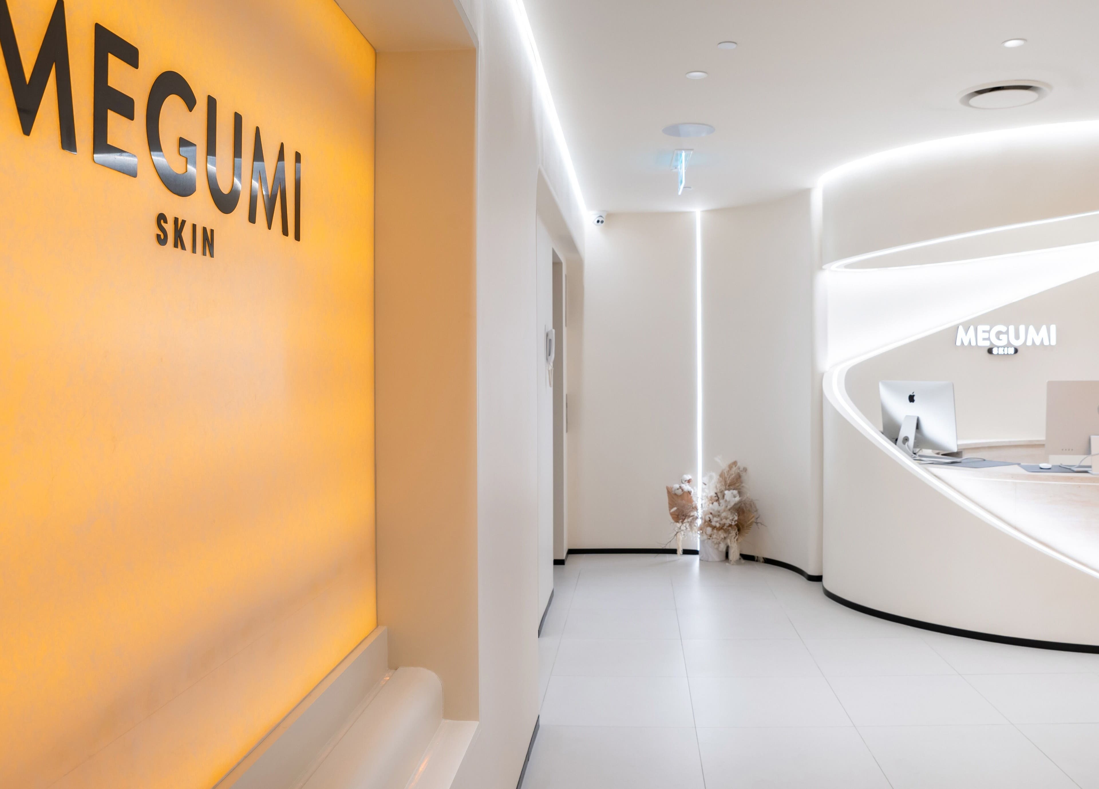 Sleek reception at MEGUMI GLOBAL, Sydney, New South Wales, AU with modern design and illuminated signage.