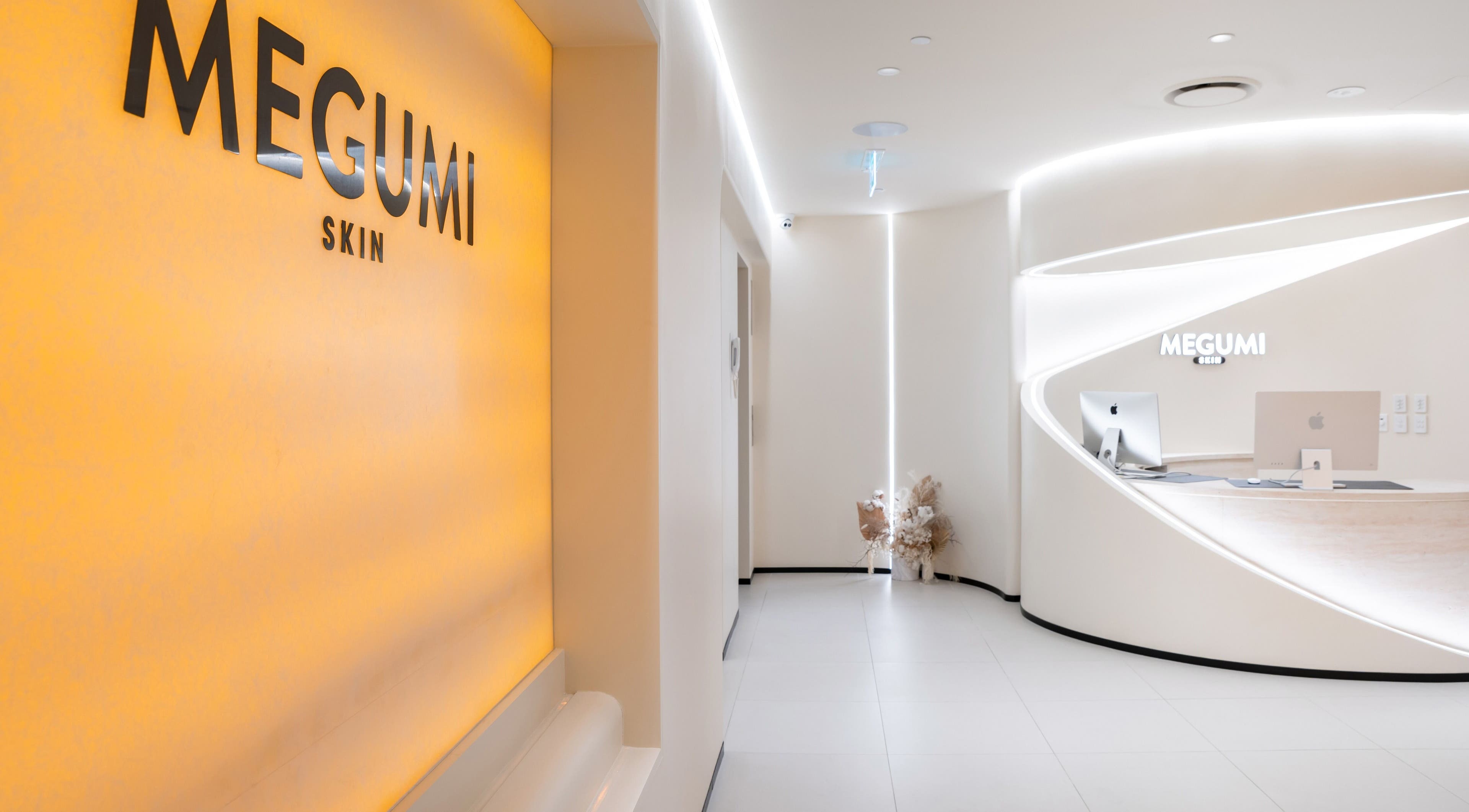 Sleek reception at MEGUMI GLOBAL, Sydney, New South Wales, AU with modern design and illuminated signage.