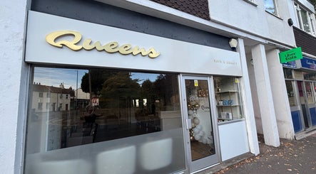 Front view of Queens Hair & Beauty in Bristol, England, GB showcasing its elegant salon entrance.