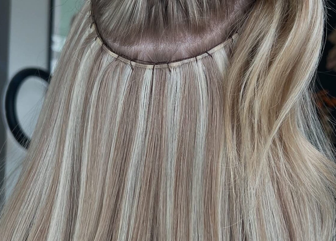 Blonde hair extensions styled at Pembroke - By Ami / What The Fluff, Pembroke, Wales, GB.
