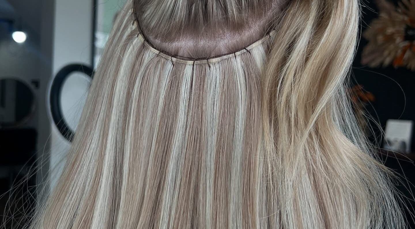 Blonde hair extensions styled at Pembroke - By Ami / What The Fluff, Pembroke, Wales, GB.