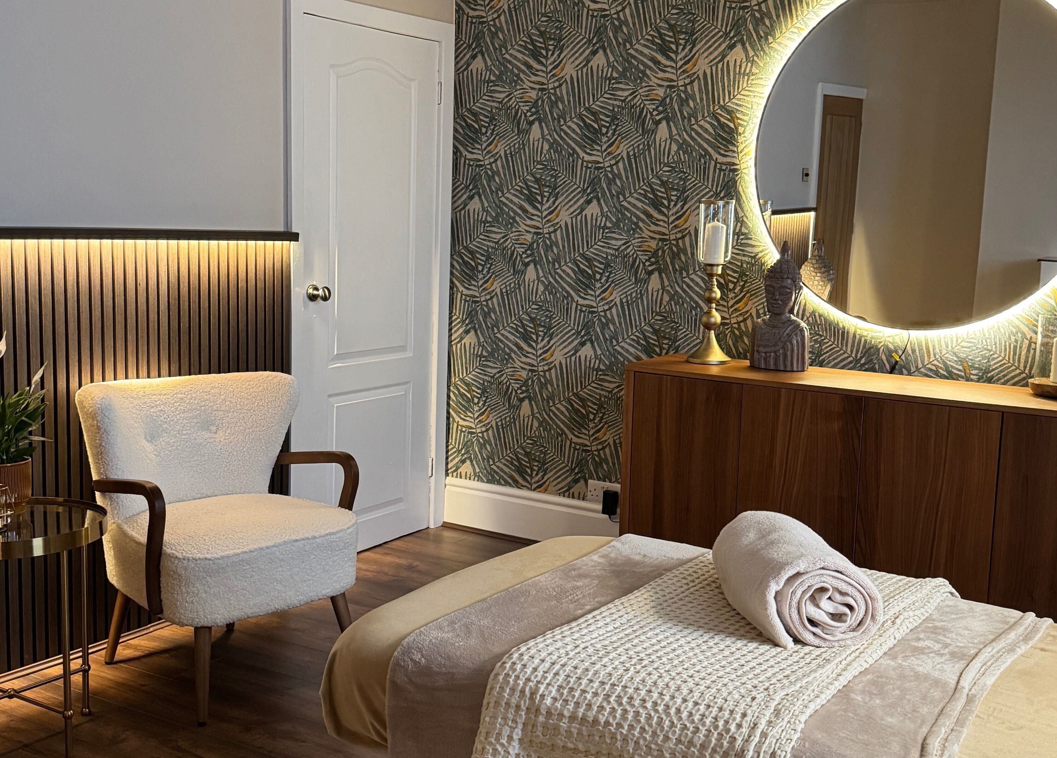 Relaxing spa room with cozy chairs and mirror at Cute Guru, West Bromwich, England, GB.