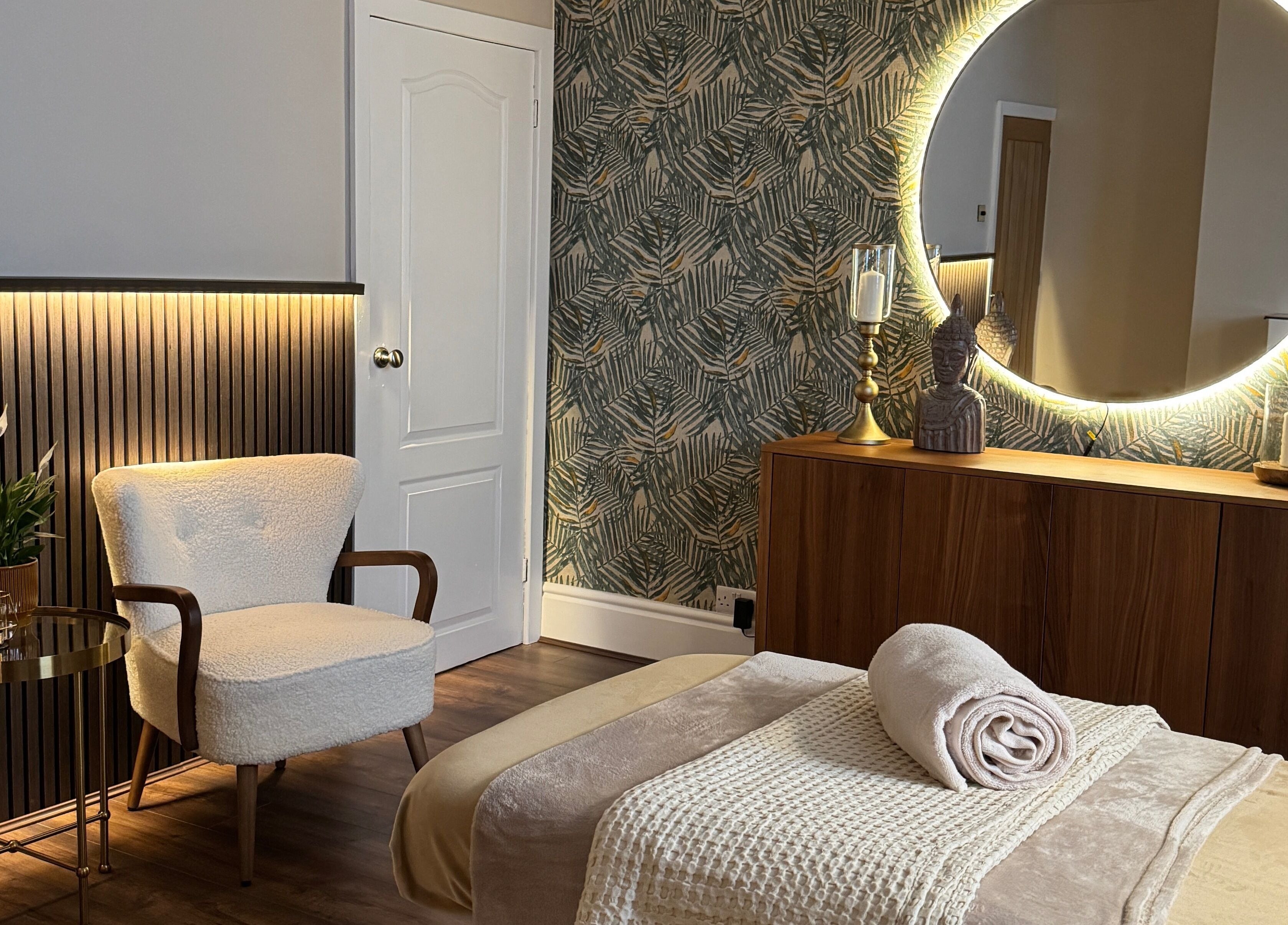 Relaxing spa room with cozy chairs and mirror at Cute Guru, West Bromwich, England, GB.