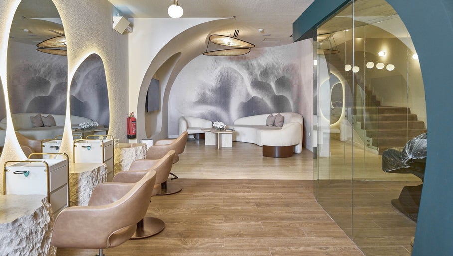 Chic interior of Obar Beauty in Riyadh, Riyadh Province, SA with cozy seating and ambient lighting.